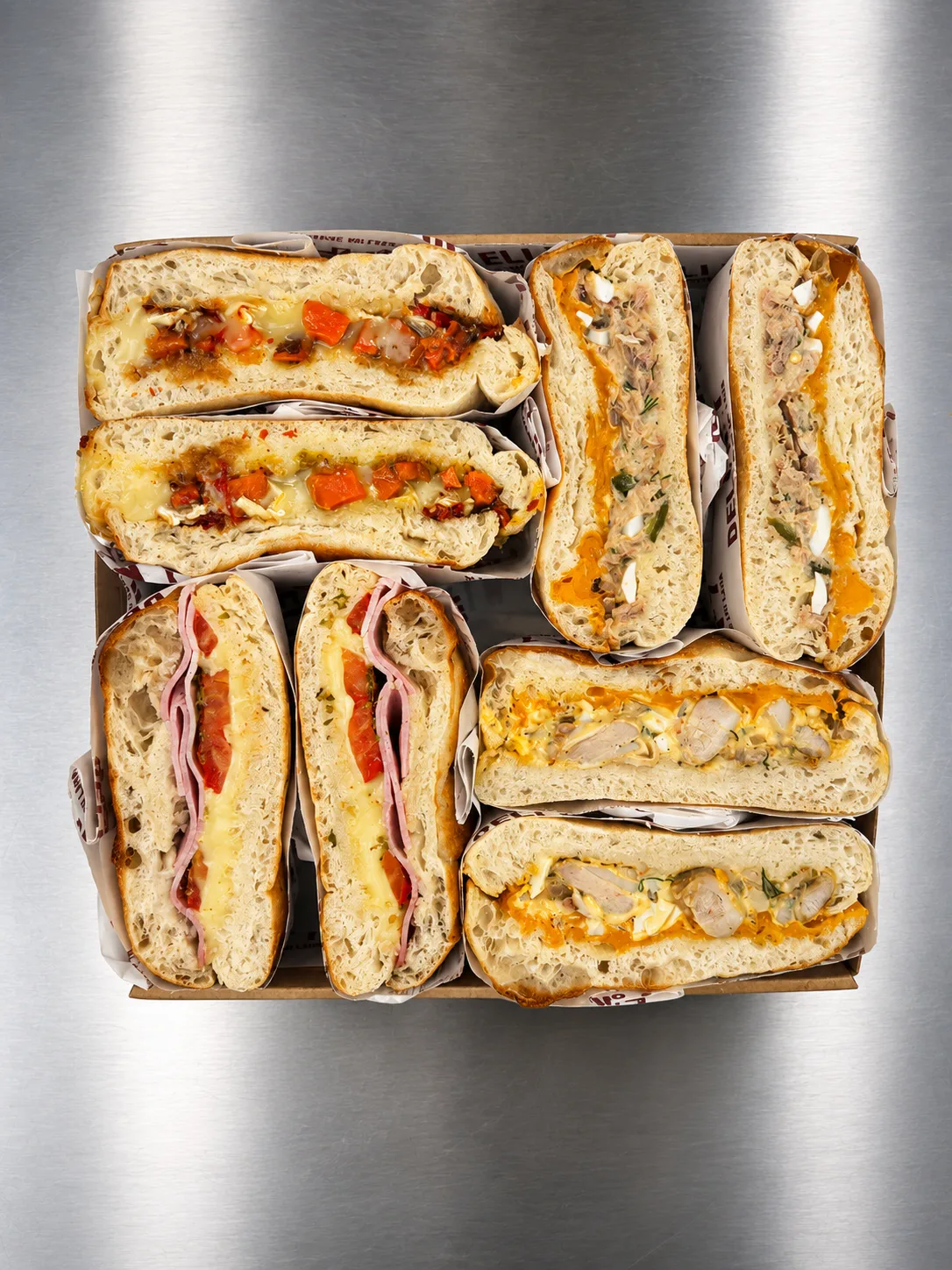 Melted Box van Deli N°7 met warme broodjes met gesmolten kaas
